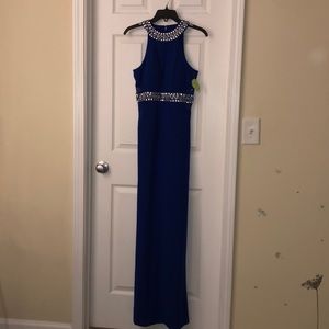 Elegant royal blue jewel encrusted women’s gown